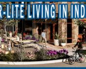 An illustration of a people-oriented area with people walking and biking and kids playing