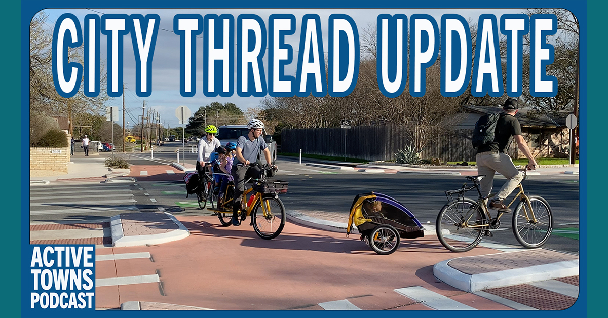 A family cycling through a Dutch-style protected intersection